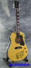John Lennon`s Acoustic Gibson Miniature guitar