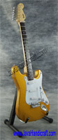 Gold Fender Stratocaster with white Pickguard